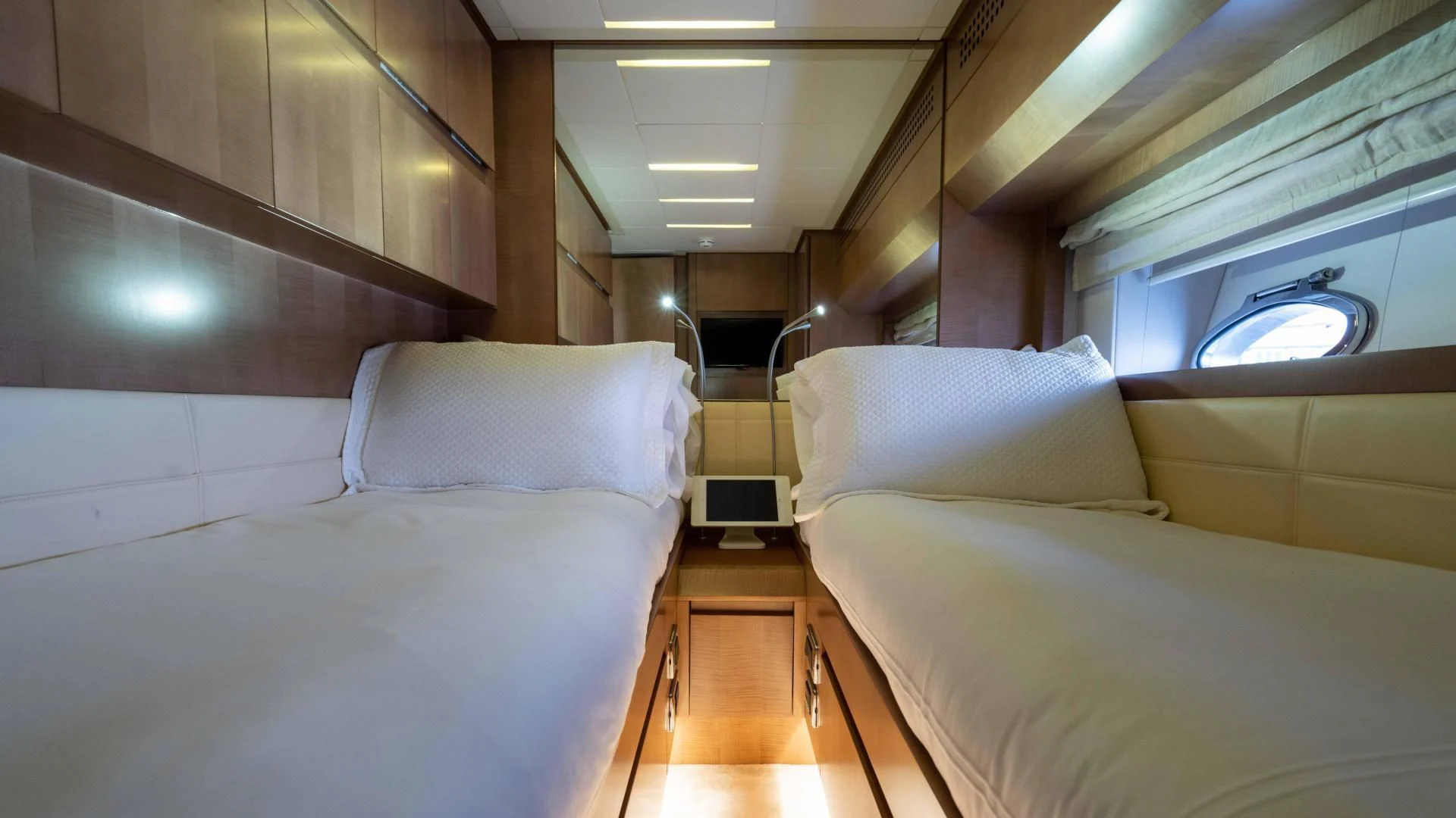 a room with beds and a ladder aboard VIXEN Yacht for Sale