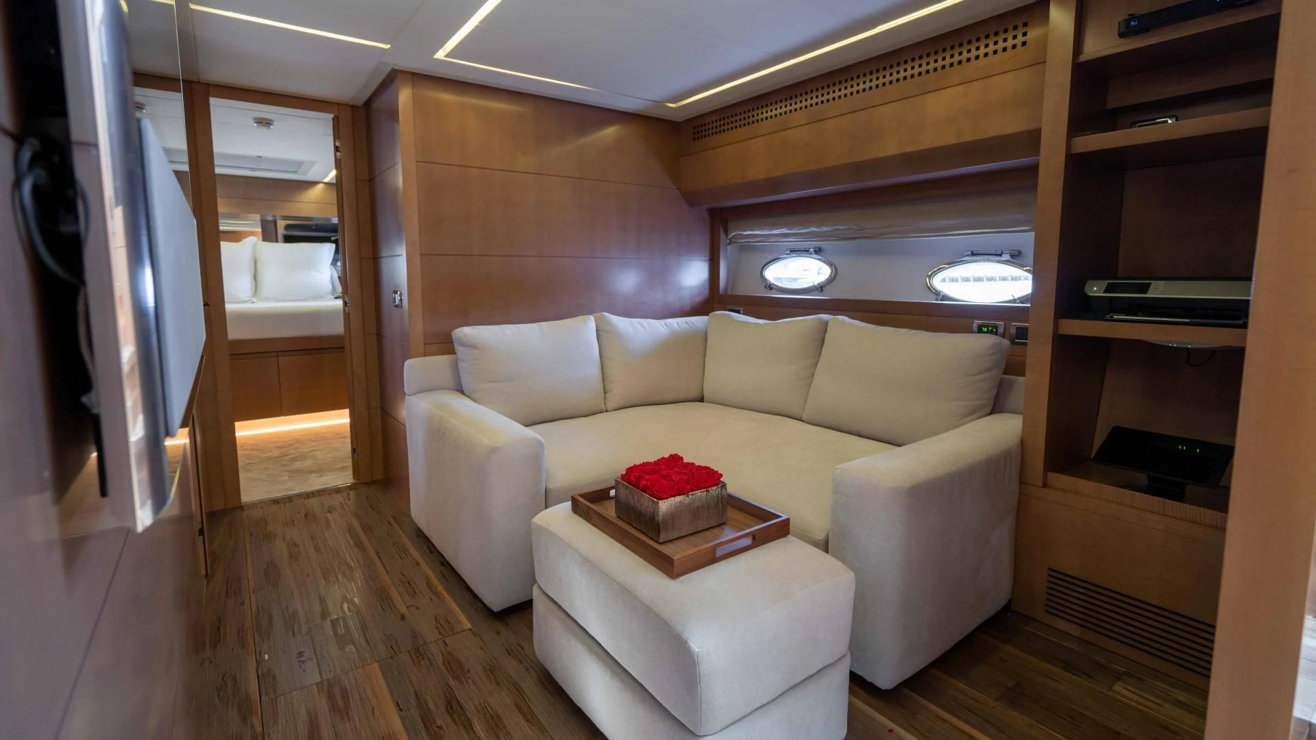 a living room with a couch and a table aboard VIXEN Yacht for Sale