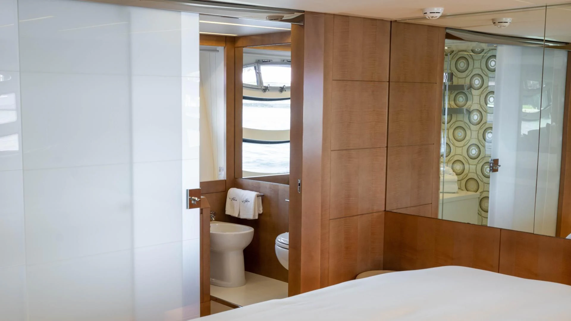 a bathroom with a glass shower aboard VIXEN Yacht for Sale