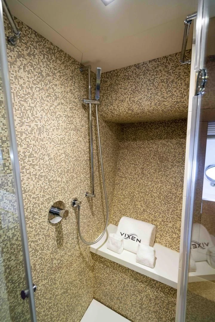 a bathroom with a shower unit aboard VIXEN Yacht for Sale