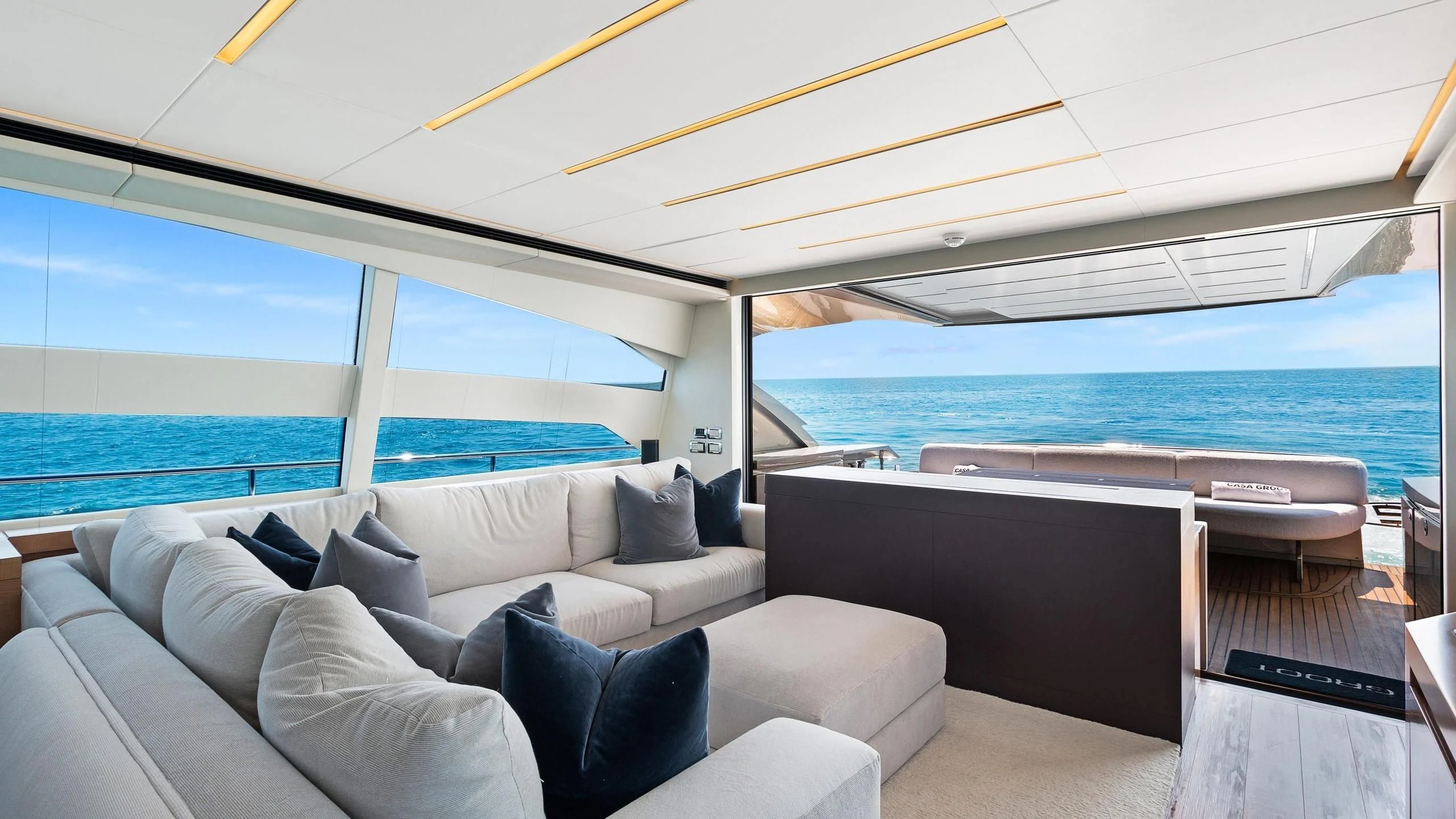 a large living room with a large ocean view aboard VIXEN Yacht for Sale