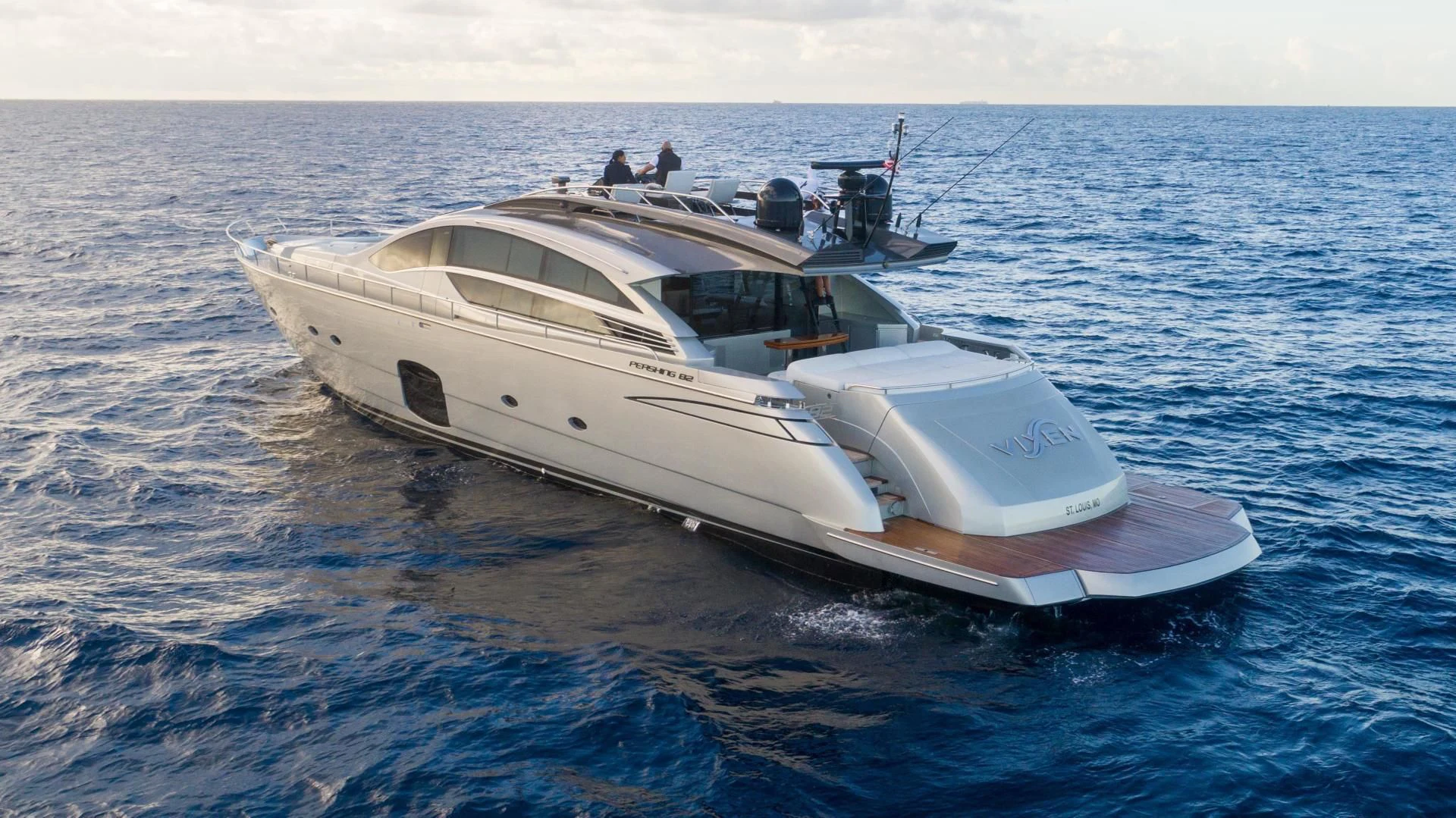 a white boat in the water aboard VIXEN Yacht for Sale