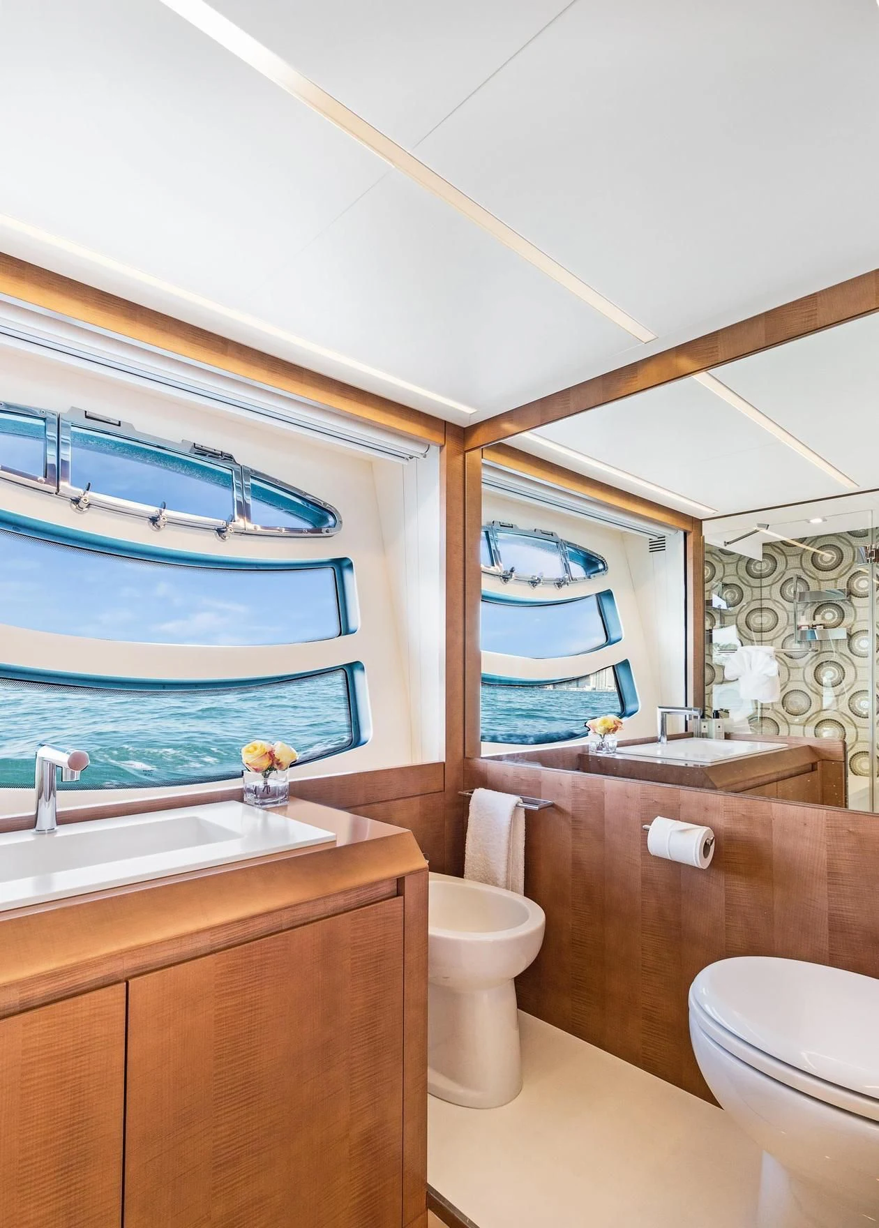 a bathroom with a large window aboard VIXEN Yacht for Sale