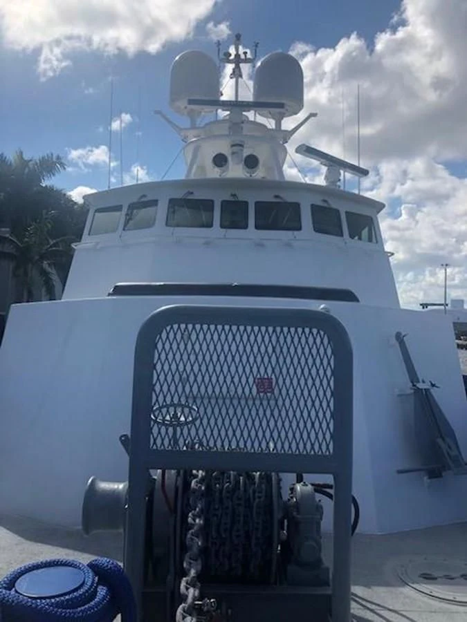 a large white ship aboard OCEANUS V Yacht for Sale