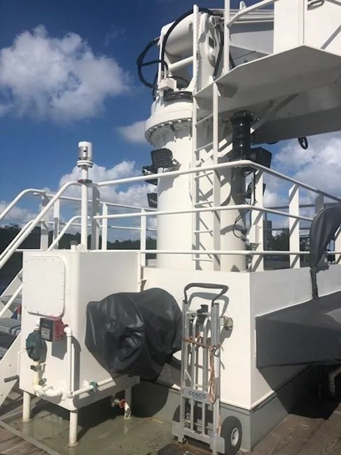 a large white machine aboard OCEANUS V Yacht for Sale