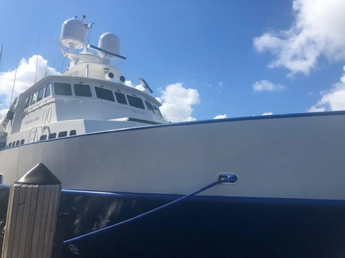 a white yacht with a propeller on it aboard OCEANUS V Yacht for Sale