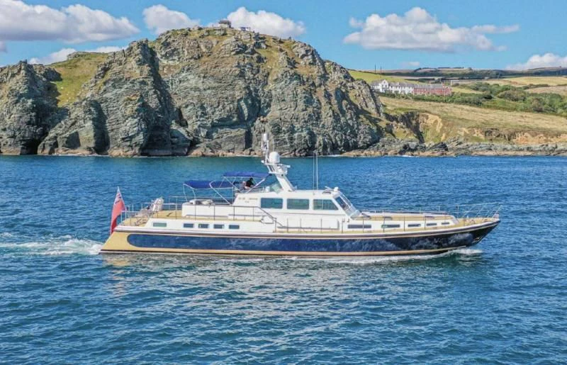 a boat on the water aboard BLUE LEGEND Yacht for Sale