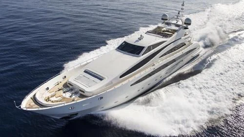a white boat on the water aboard LIBERDADE Yacht for Sale