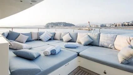 a large bed with pillows aboard LIBERDADE Yacht for Sale