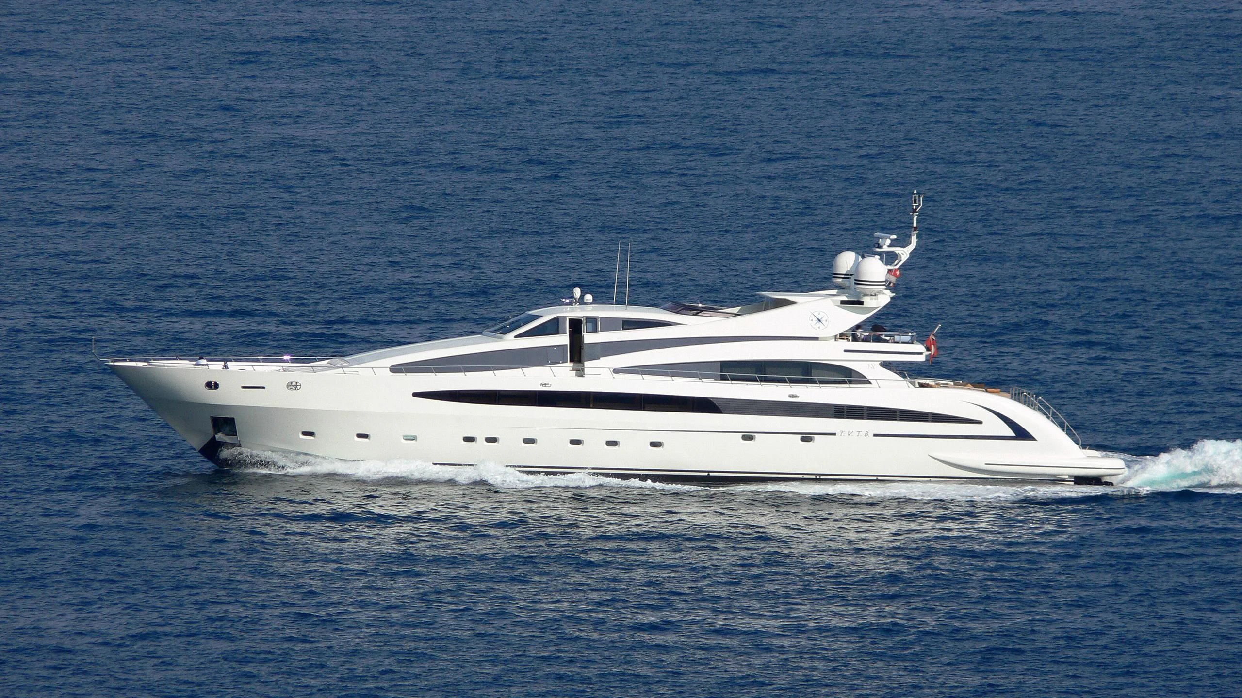 a white yacht in the water aboard LIBERDADE Yacht for Sale