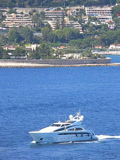 a white boat on water aboard LIBERDADE Yacht for Sale