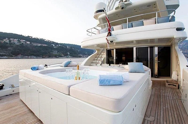 a large white boat on a dock aboard LIBERDADE Yacht for Sale
