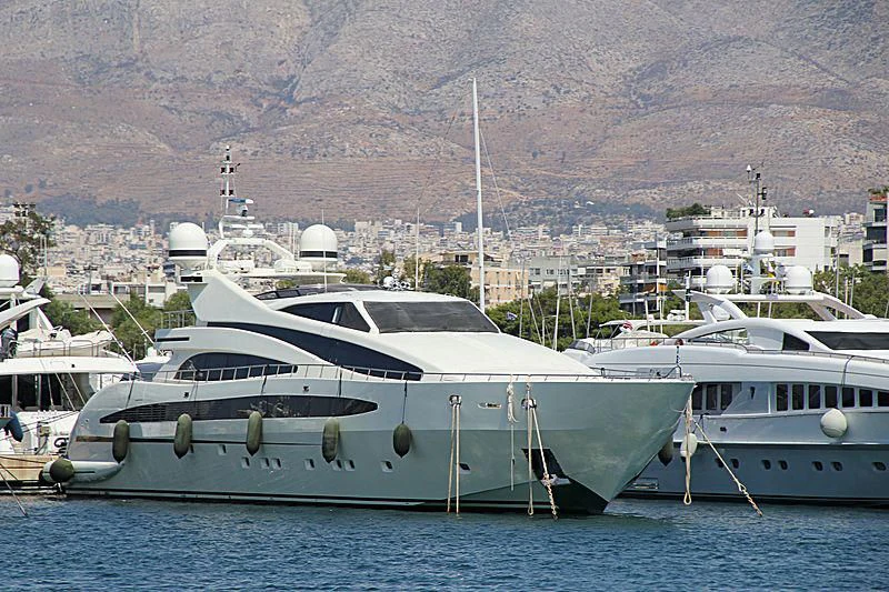 a group of boats in a harbor aboard LIBERDADE Yacht for Sale