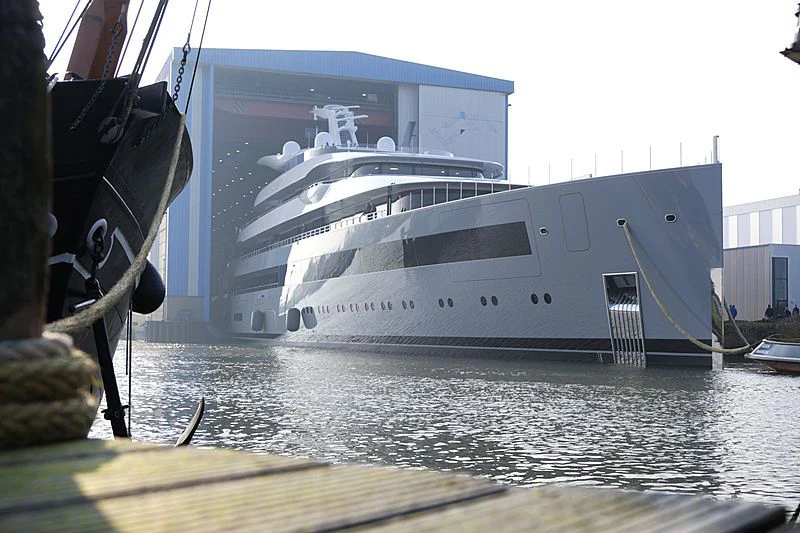 a large white boat docked aboard MOONRISE Yacht for Sale