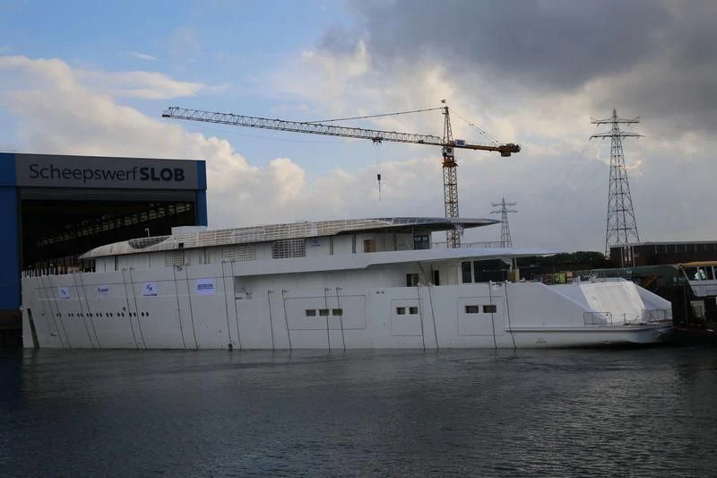 a large white boat in the water aboard MOONRISE Yacht for Sale