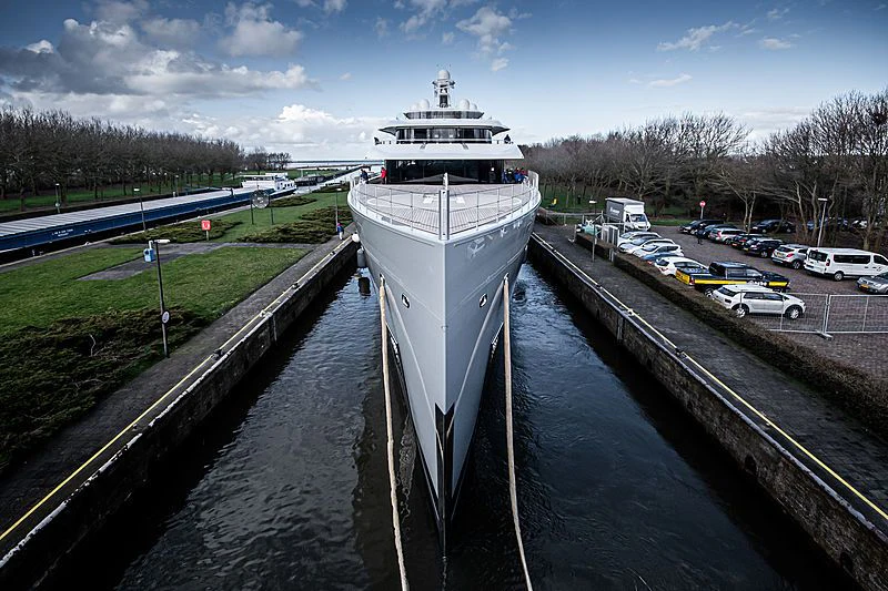 a large ship in a harbor aboard MOONRISE Yacht for Sale