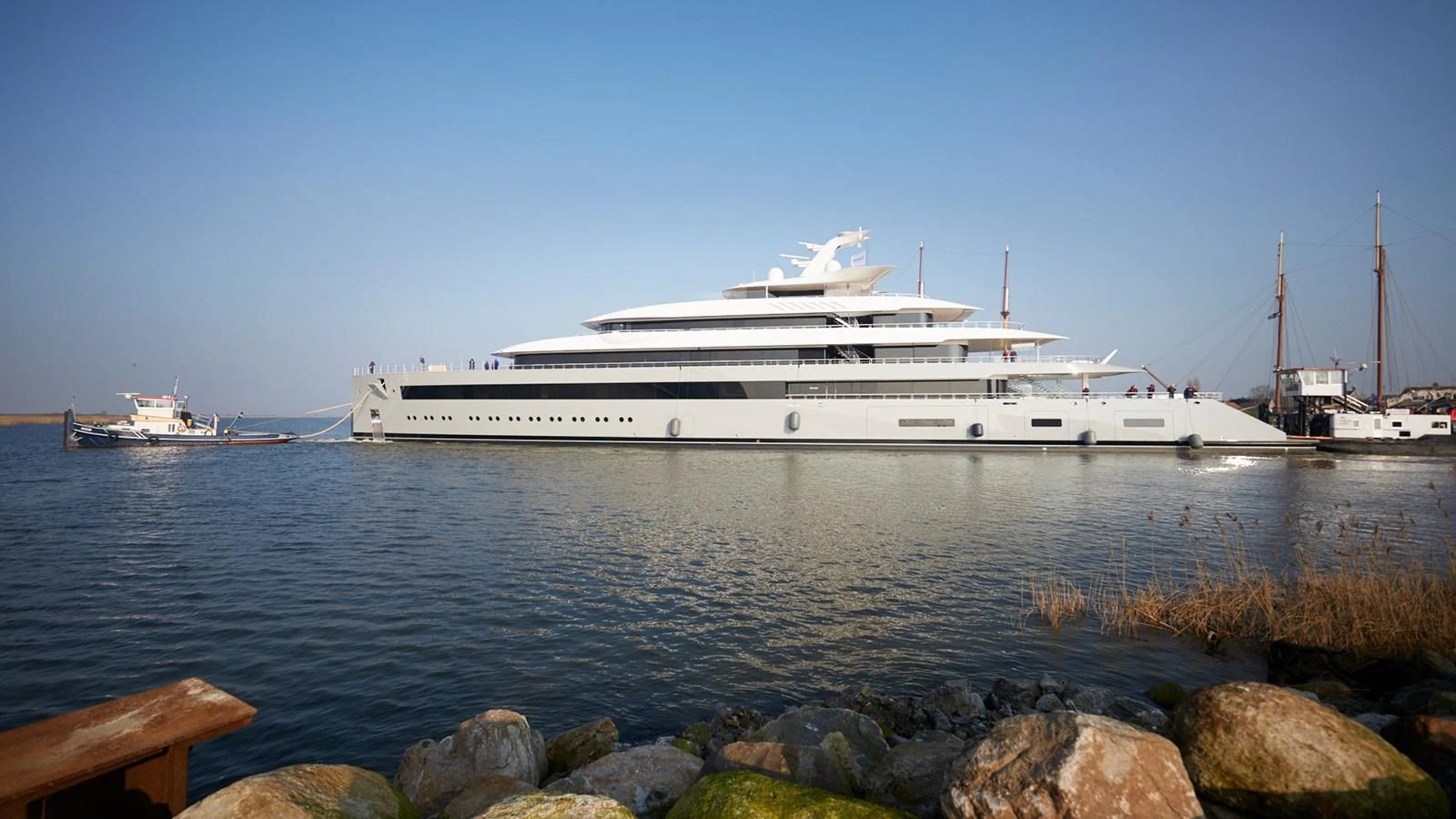 a large white ship in the water aboard MOONRISE Yacht for Sale