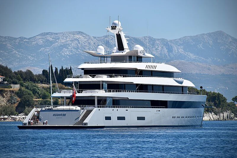 a large white boat in the water aboard MOONRISE Yacht for Sale