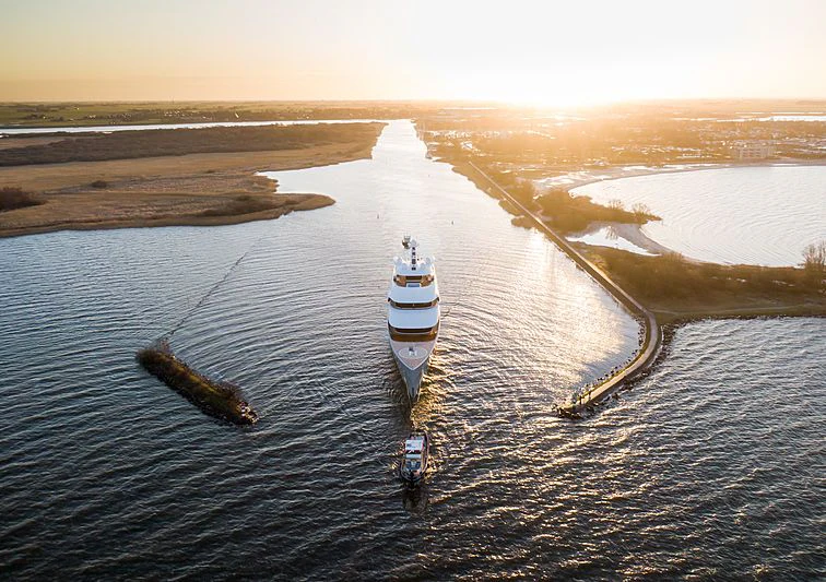 a rocket taking off from a launch pad aboard MOONRISE Yacht for Sale