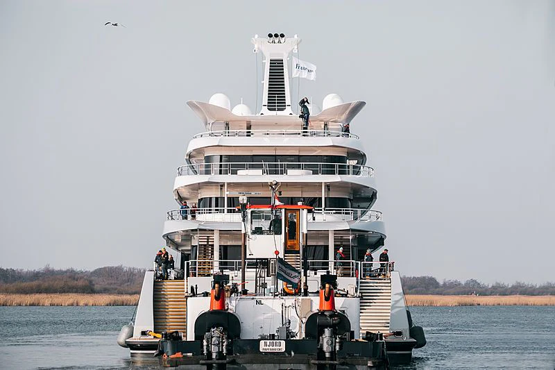 a large boat on the water aboard MOONRISE Yacht for Sale