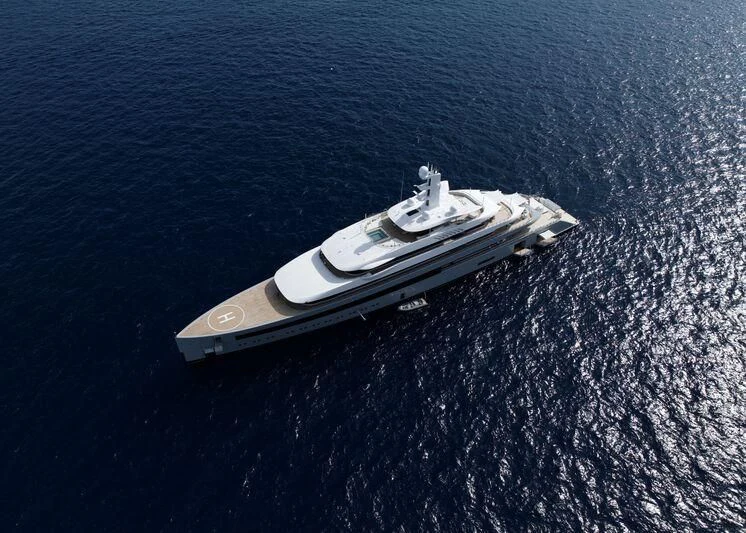 a silver and gold ring on a black surface aboard MOONRISE Yacht for Sale