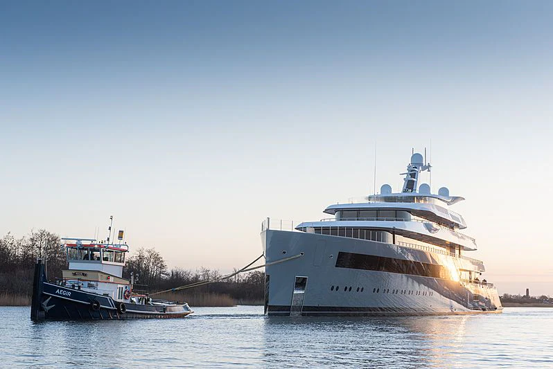 a couple of large boats in a harbor aboard MOONRISE Yacht for Sale