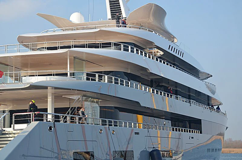 a large cruise ship docked aboard MOONRISE Yacht for Sale