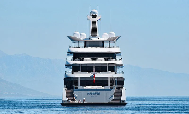 a large white boat in the water aboard MOONRISE Yacht for Sale
