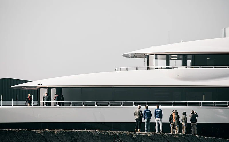 a group of people standing outside a building aboard MOONRISE Yacht for Sale