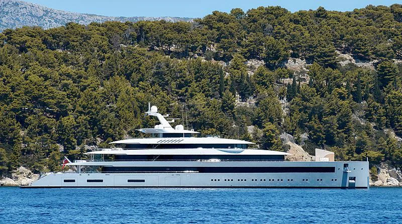 a large white yacht in the water aboard MOONRISE Yacht for Sale