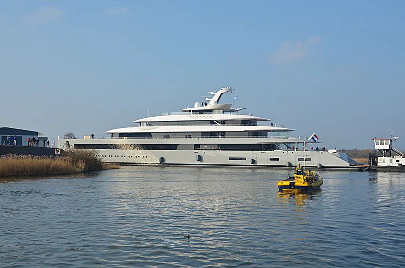 a large white ship in the water aboard MOONRISE Yacht for Sale