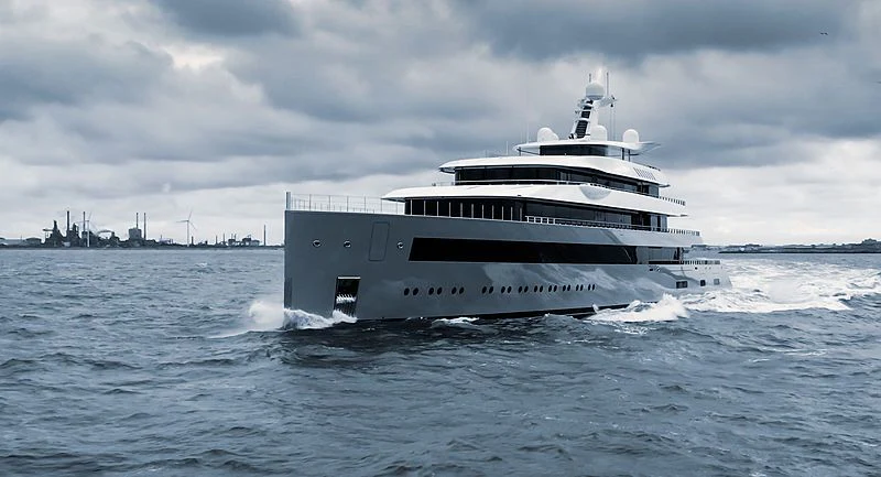 a large white boat on the water aboard MOONRISE Yacht for Sale