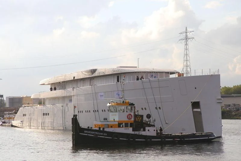 a large ship in the water aboard MOONRISE Yacht for Sale