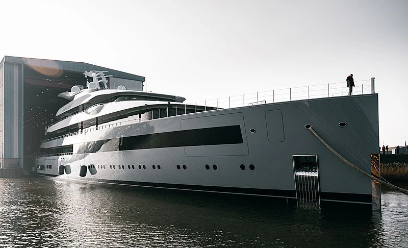 a large cruise ship docked aboard MOONRISE Yacht for Sale