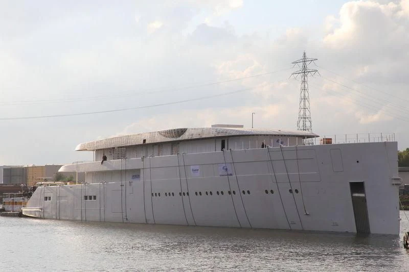 a large white building with a tower in the background aboard MOONRISE Yacht for Sale