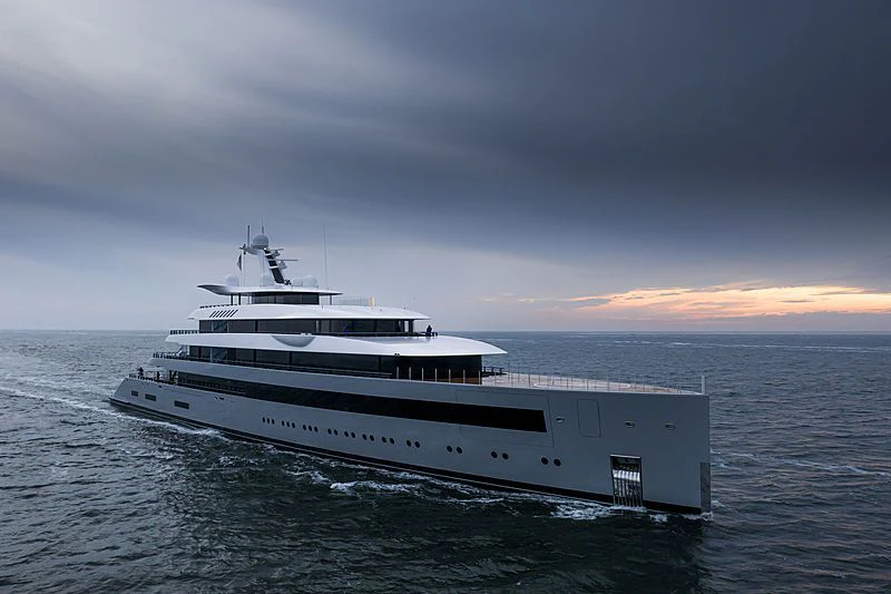 a large white ship in the water aboard MOONRISE Yacht for Sale