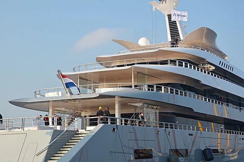 a large cruise ship docked aboard MOONRISE Yacht for Sale