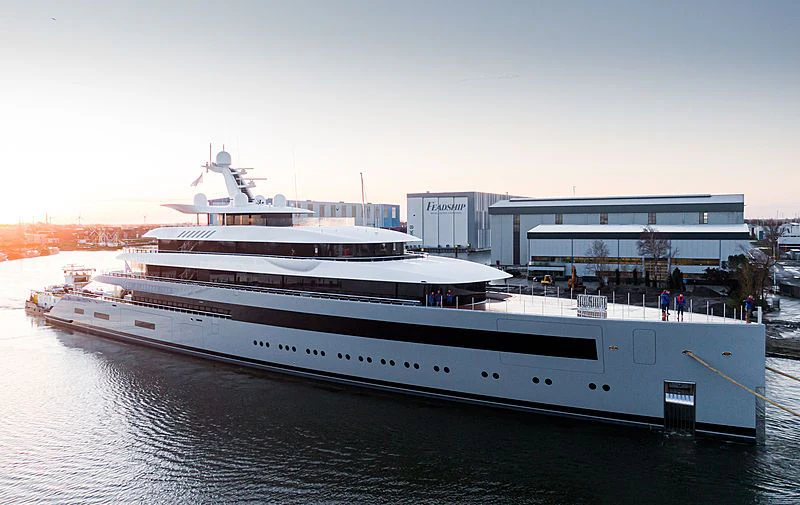 a large cruise ship docked aboard MOONRISE Yacht for Sale