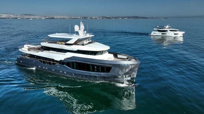 a couple of large boats in the water aboard NUMARINE 26XP/24 Yacht for Sale