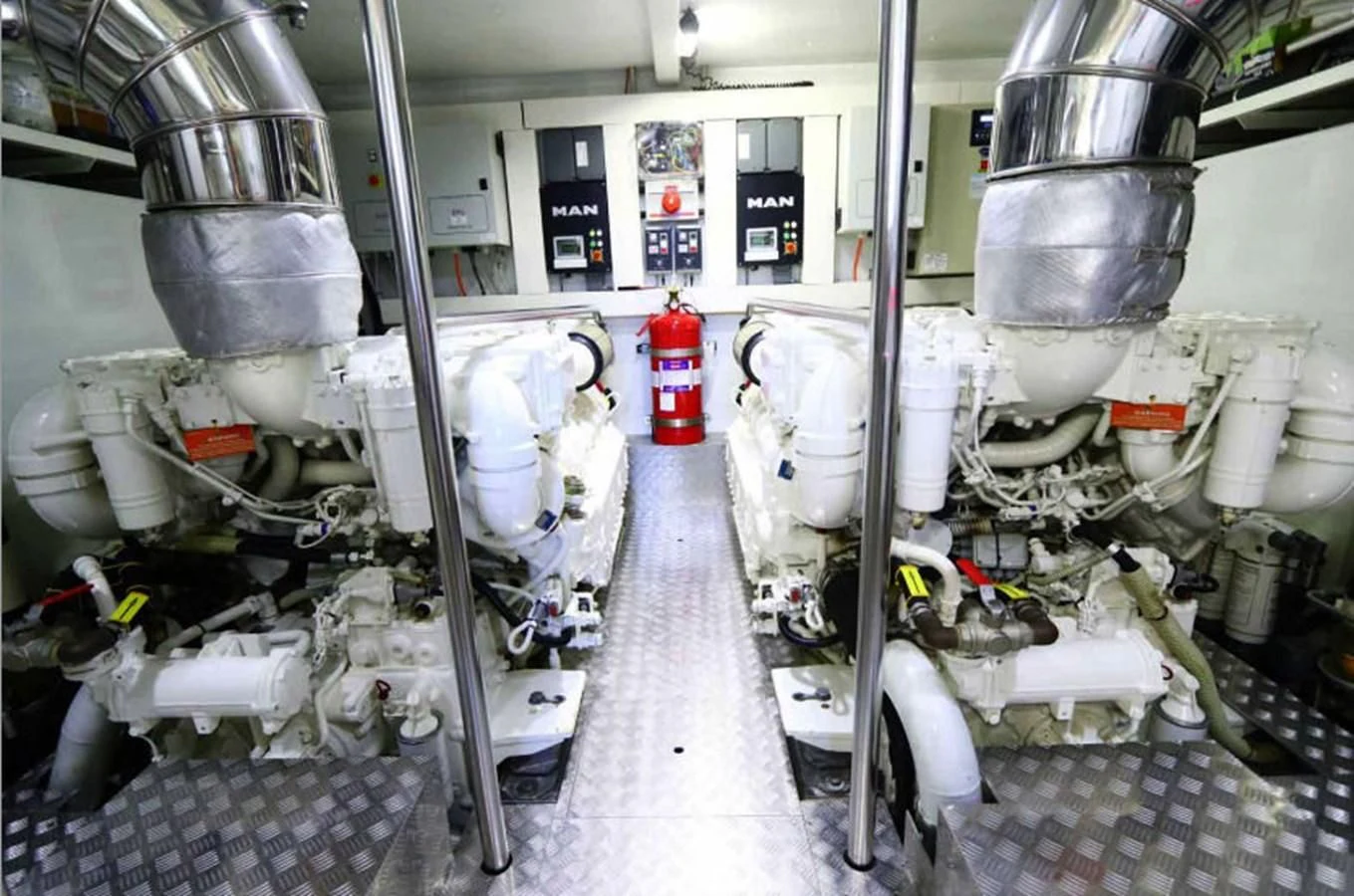 a room with machinery and pipes aboard AZIMUT 80 FLYBRIDGE Yacht for Sale