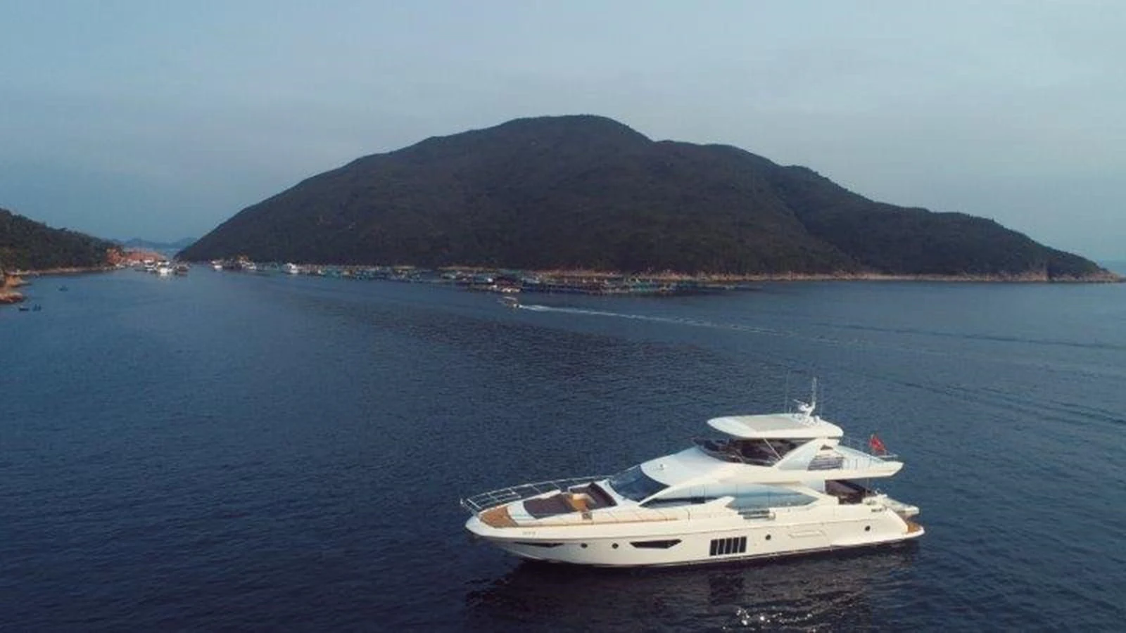 a couple of boats in the water aboard AZIMUT 80 FLYBRIDGE Yacht for Sale