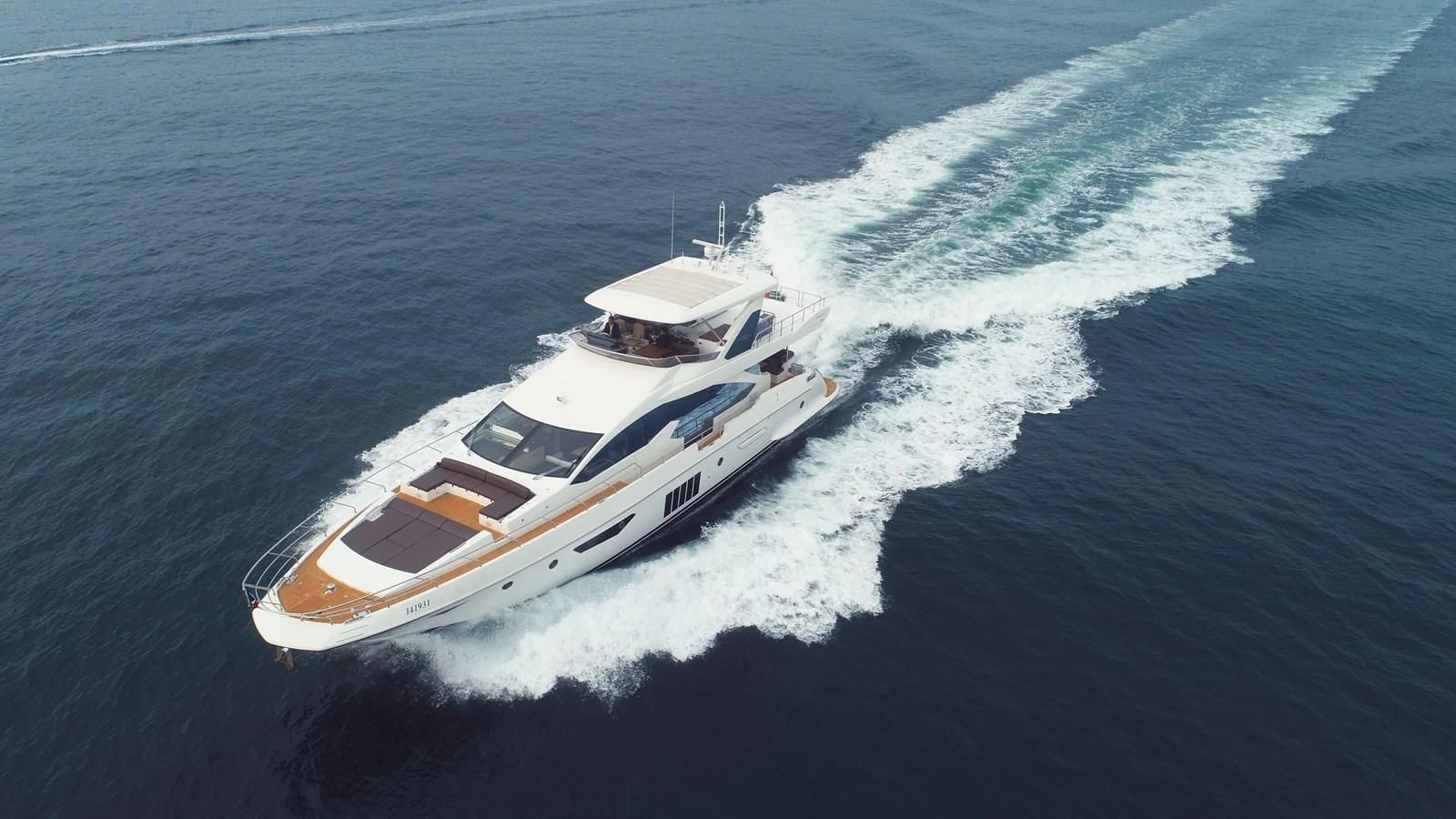 a boat on the water aboard AZIMUT 80 FLYBRIDGE Yacht for Sale