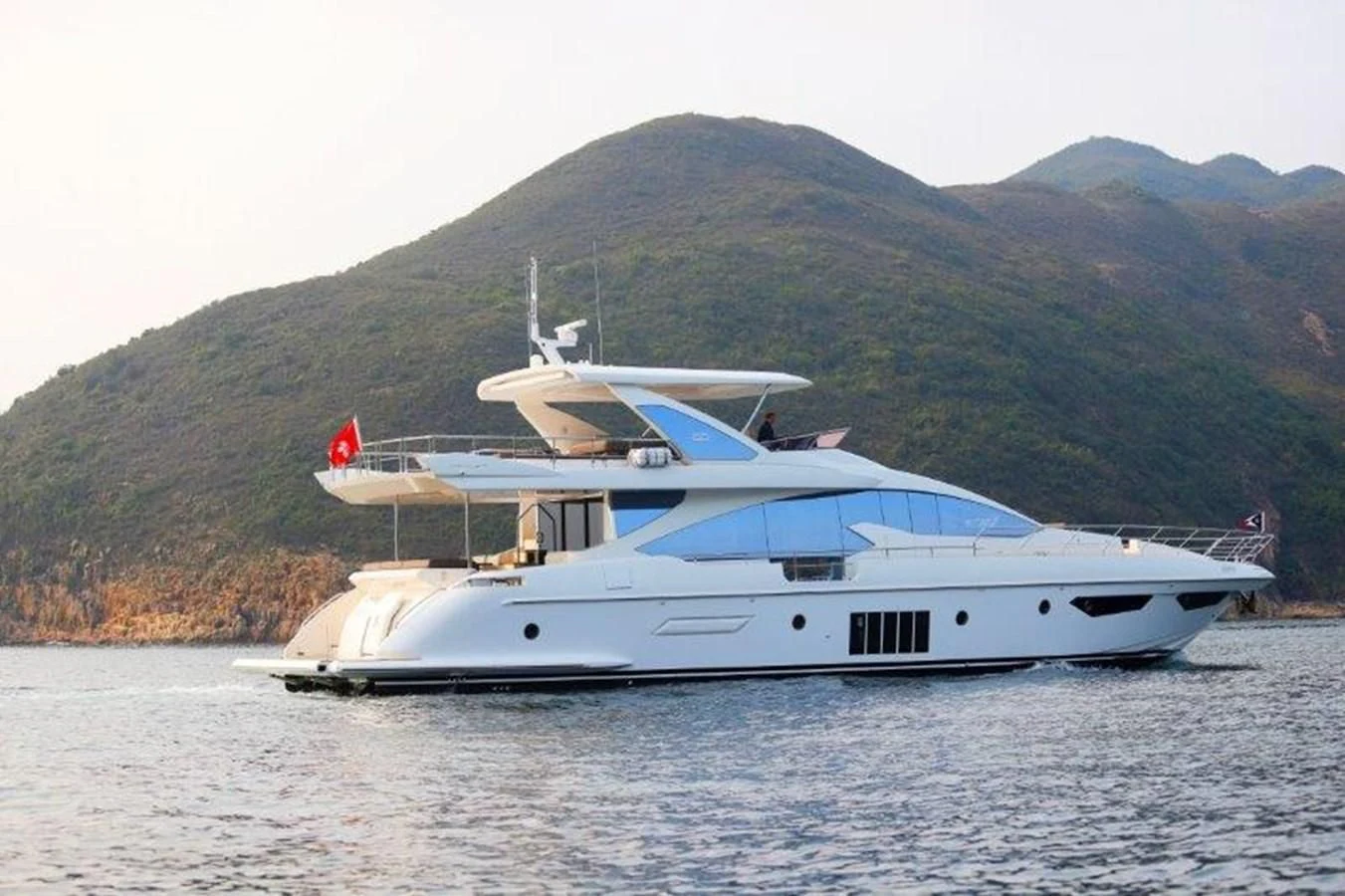 a boat on the water aboard AZIMUT 80 FLYBRIDGE Yacht for Sale