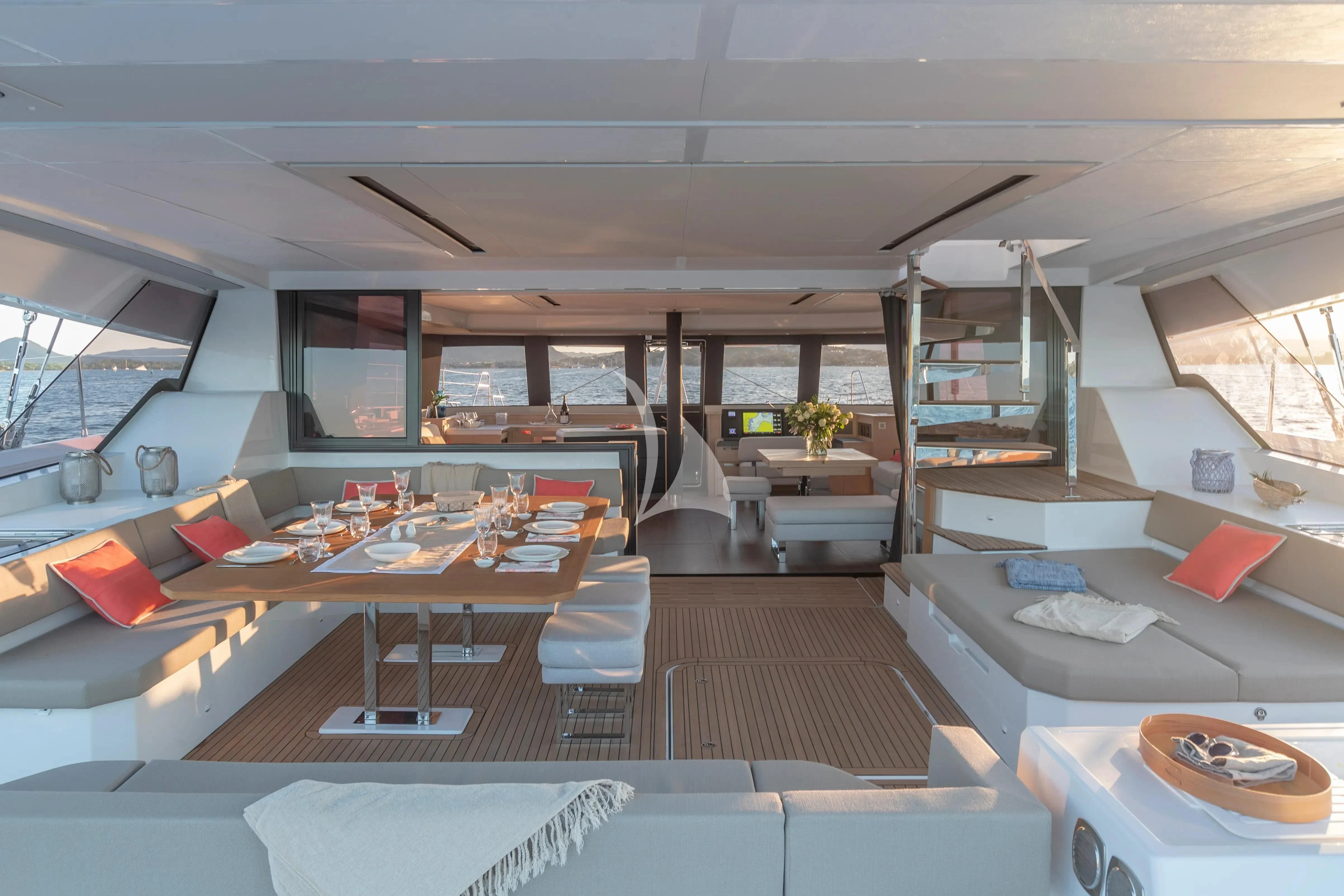 a room with a large window and a large open shelving unit aboard STEPHANIE Yacht for Charter