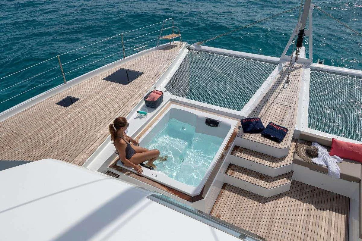 a person sitting on a boat aboard STEPHANIE Yacht for Charter