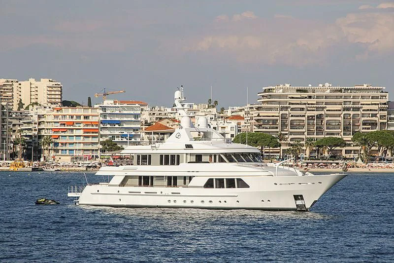 a white boat on the water aboard GO Yacht for Sale