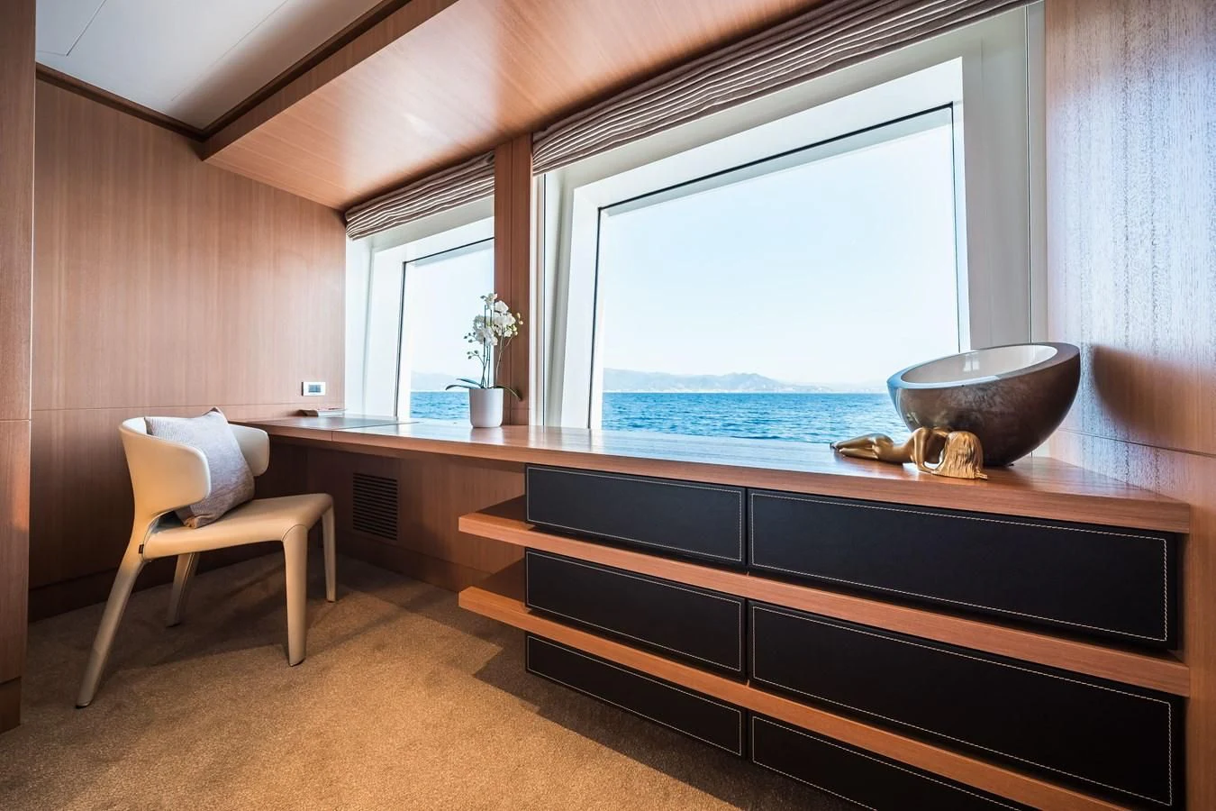 a room with a large window aboard GO Yacht for Sale