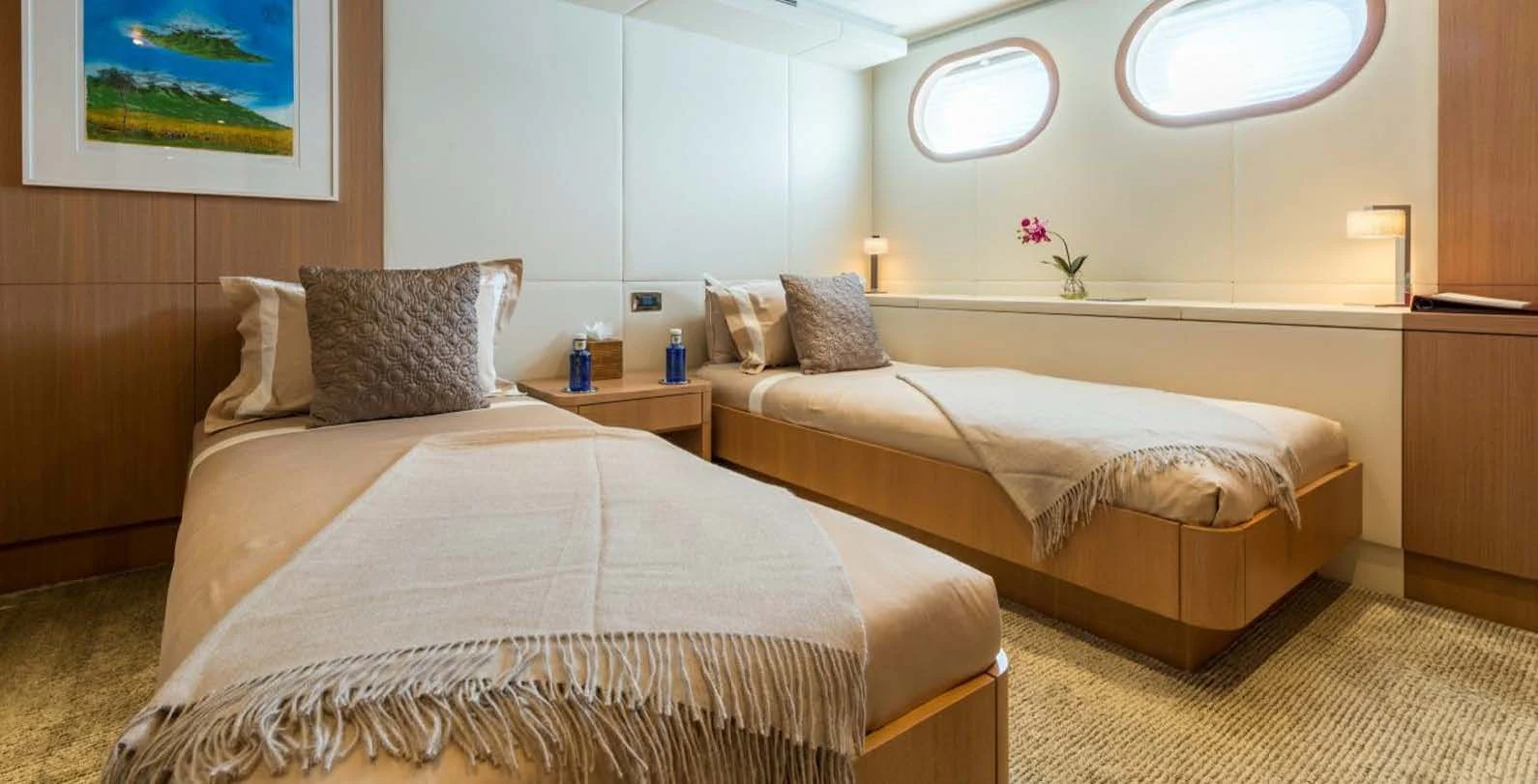 a couple of beds in a hotel room aboard GO Yacht for Sale