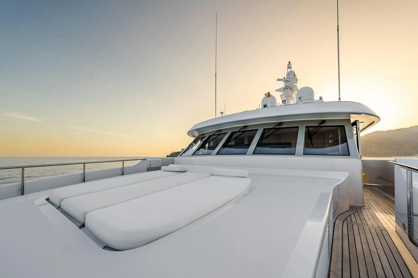 a white car with a statue on top of it aboard GO Yacht for Sale