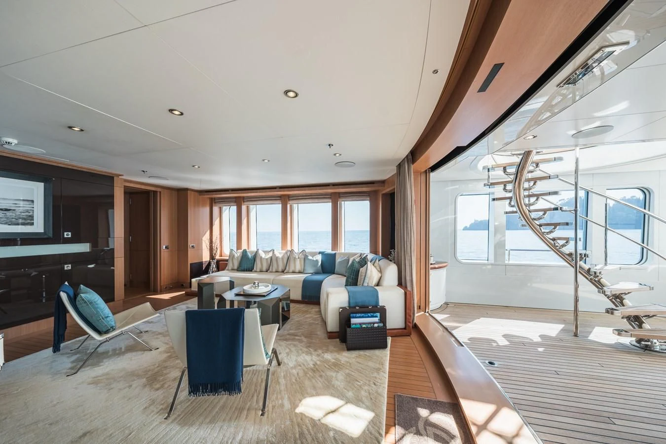 a living room with a large window aboard GO Yacht for Sale